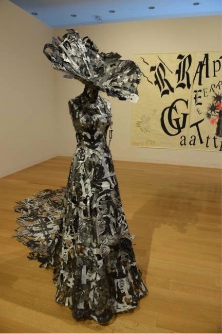 Lesley Dill, "Dress of Opening and Close of Being," 2008. In the background is part of "Rapture's Germination," 2010 Courtesy Photo/Melissa Ostrow