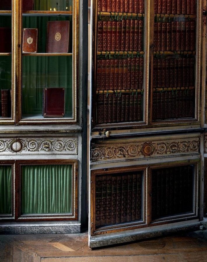 A door left ajar in Marie-Antoinette’s library, taken in 2008, Re-title.