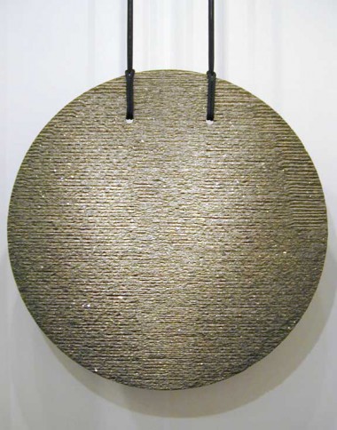 Jesús Moroles, Disc Labrador, 2000. Labrador green granite, 66 1/4 x 66 1/4 x 1 inches. 