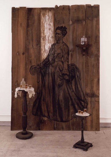 Whitfield Lovell, Bliss, 1999. Charcoal on wood, found objects, liquor. 95 x 67 x 46 inches
