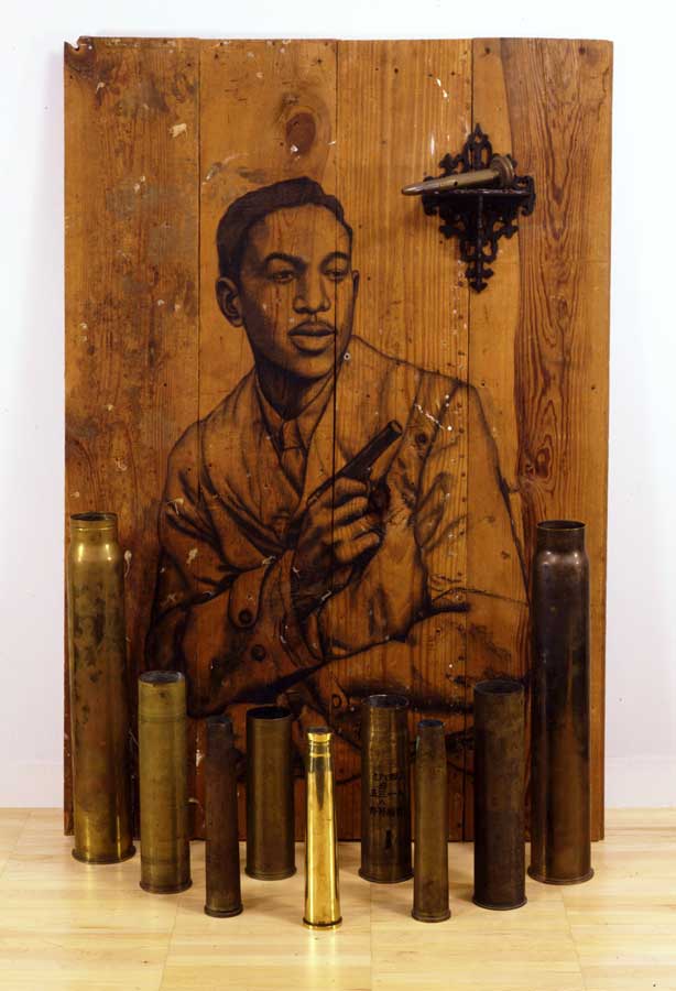 Whitfield Lovell | You're My Thrill, 2004 | Charcoal on wood, bombshell casings | 54 x 36 1/2 x 14 inches